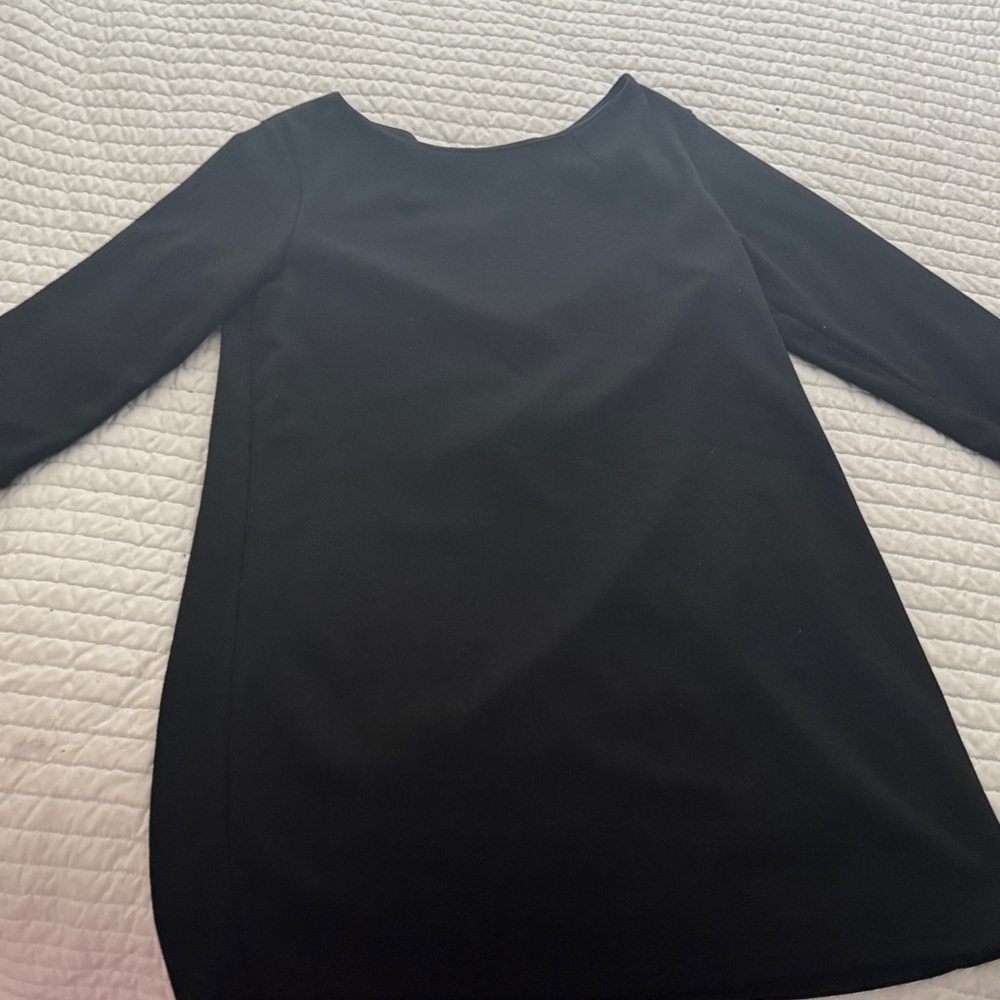 Black jersey knit tunic dress with gold zipper